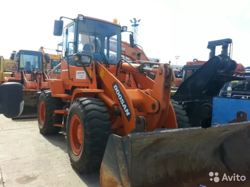 Фронтальный погрузчик doosan DL-303