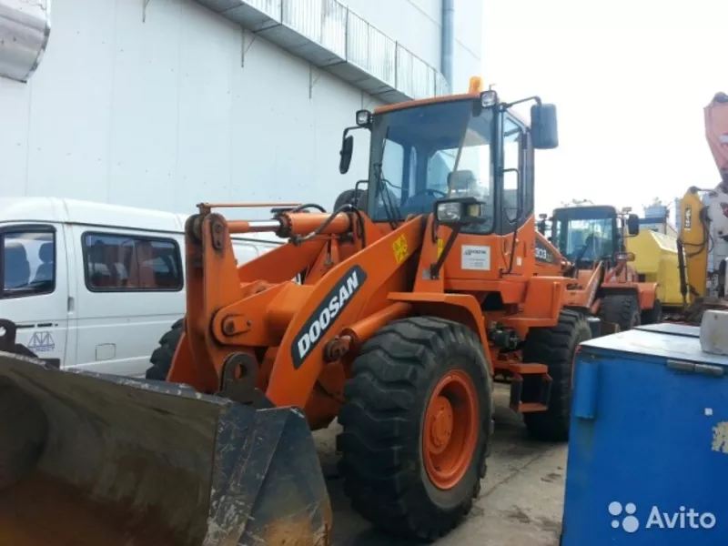 Фронтальный погрузчик doosan DL-303 2