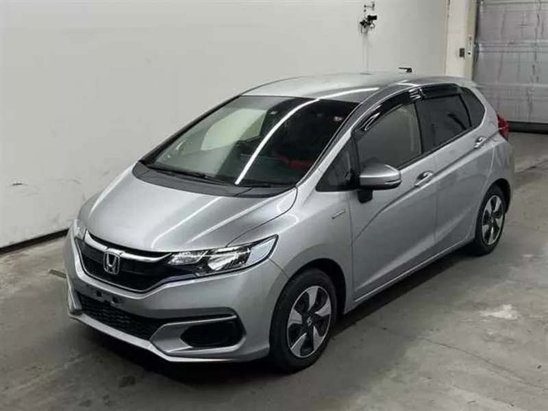 Хэтчбек гибрид Honda Fit Hybrid кузов GP5 модификация Hybrid Base Grad 4